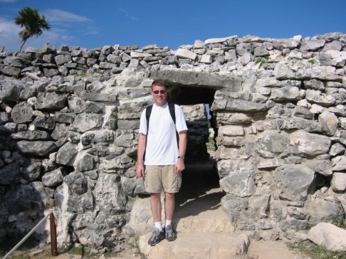 Scott climbing through the ruins
